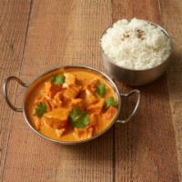 Chicken Korma · Marinated boneless meat cooked with curry, cream, nuts and delicate spices. Served with basm...