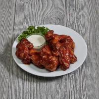 Chicken Wings · Choice of hot, mild, BBQ or fire sauce. Served with choice of ranch or blue cheese sauce.