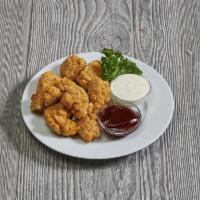 Boneless Chicken Wings · Crispy, boneless chicken bites with choice of ranch or blue cheese sauce.