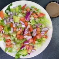 Tossed Salad · lettuce, tomatoes, cucumber and red onions. Balsamic vinaigrette on the side. Served with ho...