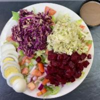 Healthy Salad · lettuce, tomatoes, cucumbers, red onions, red and white cabbage, red beets and sliced hard-b...
