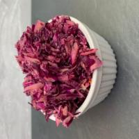 Red Cabbage Salad (HALF LBS) · shredded red cabbage spiced with Israeli spices and zest of lemon.