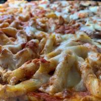 Baked Ziti Pizza · Penna mixed with rich tomato sauce, ricotta, mozzarella and grated Parmigiana cheese.
