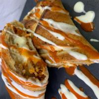 Soy Buffalo Chicken Roll · Soy chicken topped with ranch dressing and Buffalo sauce.