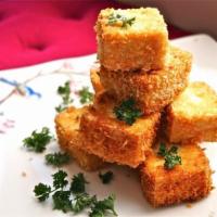 2. Golden Tofu · Bite sized pieces of deep fried tofu served with sweet sauce topped with crushed peanuts.