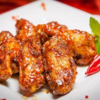 8. Spicy Wings (6 piece) · Deep fried chicken wings with spicy sweet hot and sour sauce.