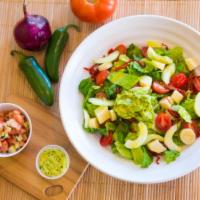 Avocado Salad · Romaine, cucumber, cherry and sun-dried tomatoes, heart of palm, avocado and lemon vinaigret...