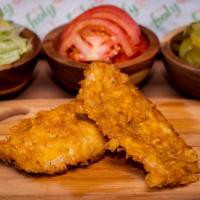 Corn Flake Schnitzel Sandwich · Corn flake crusted crispy chicken. Served on a baguette with a choice of lettuce, tomatoes, ...