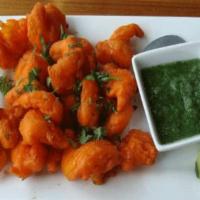 Shrimp Pakora · A quick appetizer made with shrimp. Breaded shrimp is deep-fried to make a tasty combination...