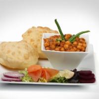 Cholle Bhatura · Cholle Bhatura is a combination of spicy chickpeas and deep fried bread called 'bhatura' mad...