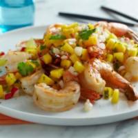 Mango Shrimp · Pan stir-fry is an Indian feast of sweet shrimp made with fresh mangoes and spicy basil.