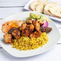 Kebab Combo Platter · Includes rice, hummus, side salad and pita bread.