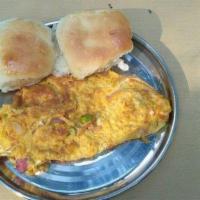 Omelet and Bread · Indian-style spicy omelet served with buttered bread.