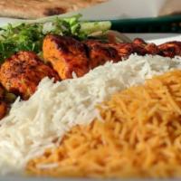 Chicken Kebab Entree · Boneless chicken breast marinated with fresh herbs, skewered and char-broiled. Served with s...