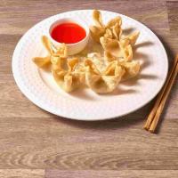 6 Crab Cheese Wonton · Cream cheese blended with crab and green onions.