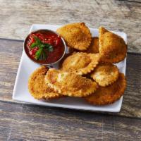Fried Ravioli · 8 pieces of cheese ravioli fried to a golden brown and served with our homemade marinara sau...