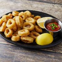 Fried Calamari · Fresh caught calamari hand battered and fried. Served with fresh lemon wedges and our specia...
