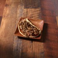 Gyros Pita Wrap · Tender, thinly sliced layers of seasoned lamb and beef, broiled on a vertical skewer, topped...