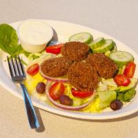 5. Falafel with Hummus Combo · Served with beverage and choic0e of side.