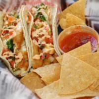 Baja Fish Taco · 2 battered fish fillet tacos, double wrapped in corn tortillas with pico de gallo and spicy ...