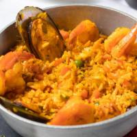 Paella Marinera  · Yellow rice with seafood. 