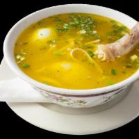 Caldo de Gallina · Hen soup Peruvian style. 