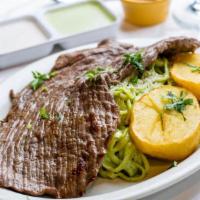 Tallarin Verde Con Bistec · Steak with spaghetti in a green Peruvian-style basil, spinach and cheese sauce.