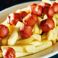 Salchipapas · Slice of hot dog with french fries. 