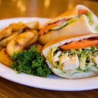 Chicken Caesar Pocket Combo · Our Caesar salad roasted chicken and tomato served in our homemade pocket bread. Served with...
