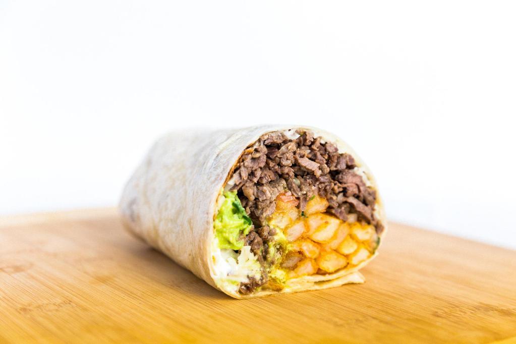 California Style Burrito · Your choice of meat, delicious french fries, pico de gallo, guacamole, sour cream, and cheese.