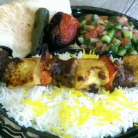 Chicken and Chorizo Kabob Plate · Marinated chicken breast, chorizo, onions and peppers. Served with basmati rice, grilled tom...
