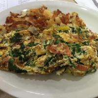 Balkan Scrambled Eggs · 3 scrambled eggs mixed with green peppers, onions, mushrooms, tomatoes, spinach, ham, feta c...