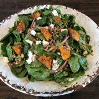 Roasted Butternut Squash Spinach Salad · Spinach, roasted butternut squash, Italian farro, and red onion tossed in a house-made balsa...
