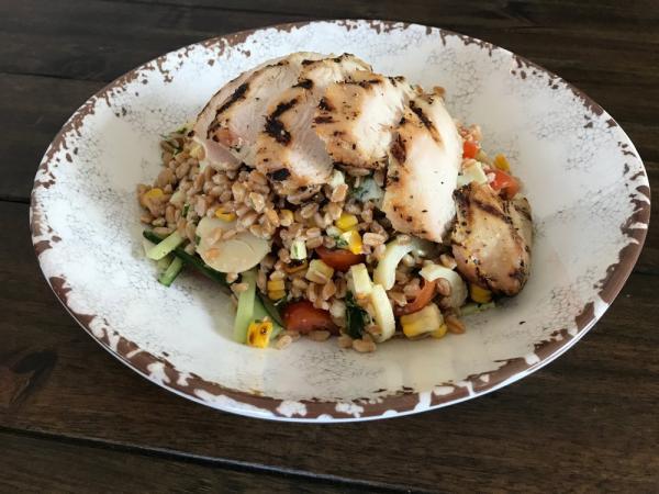 Farro Bowl · Italian farro salad tossed with hearts of palm, grape tomatoes, grilled corn, cucumber and a house-made lemon herb vinaigrette. Served Cold