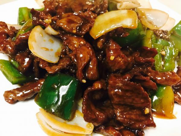 Green Pepper Beef · Stir fried sliced beef steak with sliced green bell peppers and onions.