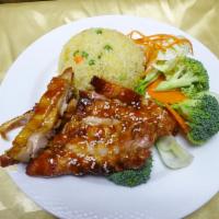 C1. Teriyaki Chicken Lunch · Chicken leg patty, steamed vegetables with teriyaki sauce. Sprinkled with sesame seeds.