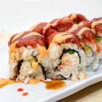 Red Dragon Roll  · Crab meat, avocado and cucumber inside. Spicy tuna and eel sauce on the outside.