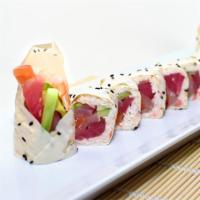 Sumo Roll · Tuna, salmon, albacore, crab meat, cucumber and avocado on the inside. Soy paper on the outs...
