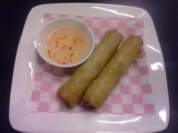 2 Fried Egg Rolls · Savory filling wrapped in a paper thin wrapper and deep fried.