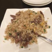 Beef Fried Rice · Fried white rice with soy sauce, eggs, peas, carrots and green onions with beef. Gluten-free.