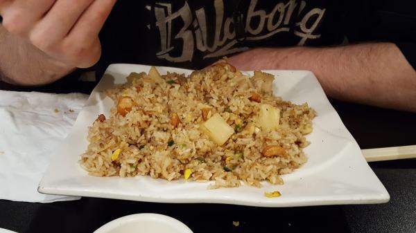 Pineapple Fried Rice · Shrimp, pork, chicken, cashew nut, pineapple and onion. Gluten-free.
