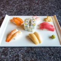 Sushi Deluxe Dinner · California roll, 10 pieces of sushi. Chef's choice. Comes with miso soup.