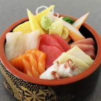 Chirashi Dinner · An assortment of sashimi, chef's choice, on a bed of sushi rice. Comes with miso soup.