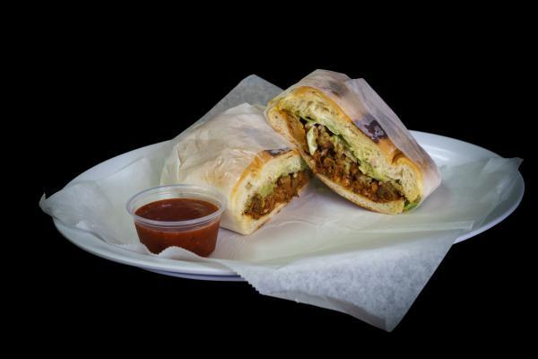 Torta · Choice of Meat, Lettuce, Tomato, Onion, Avocado, Mayonaise, Cheese, and Pickled Jalapeño.