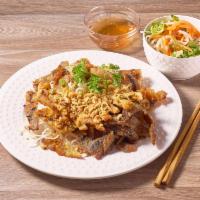 R1. Combination Noodle Bowl · This vermicelli noodle bowl is made with egg rolls, grilled pork, chicken, beef and shrimp.