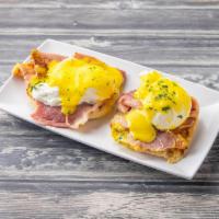 Eggs Benedict Breakfast · 2 poached eggs, bacon or ham and hollandaise sauce.
