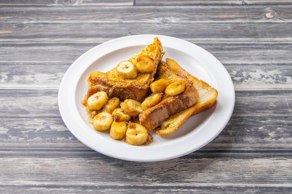 PB Stuffed French Toast Breakfast · Peanut butter, caramelized bananas and maple syrup.