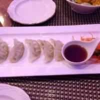 10. Steamed Gyoza · Dumpling with a minced filling. 
