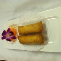 11. Lobster Spring Roll 2 Pieces  · Rice paper or crispy dough filled with shredded vegetables. 