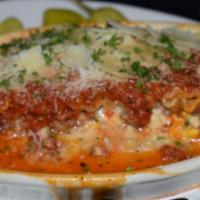Lasagna Meat and Cheese (Baked) · Layered noodles with meat, cheeses, eggs, herbs and our homemade sauce. Served with garlic b...